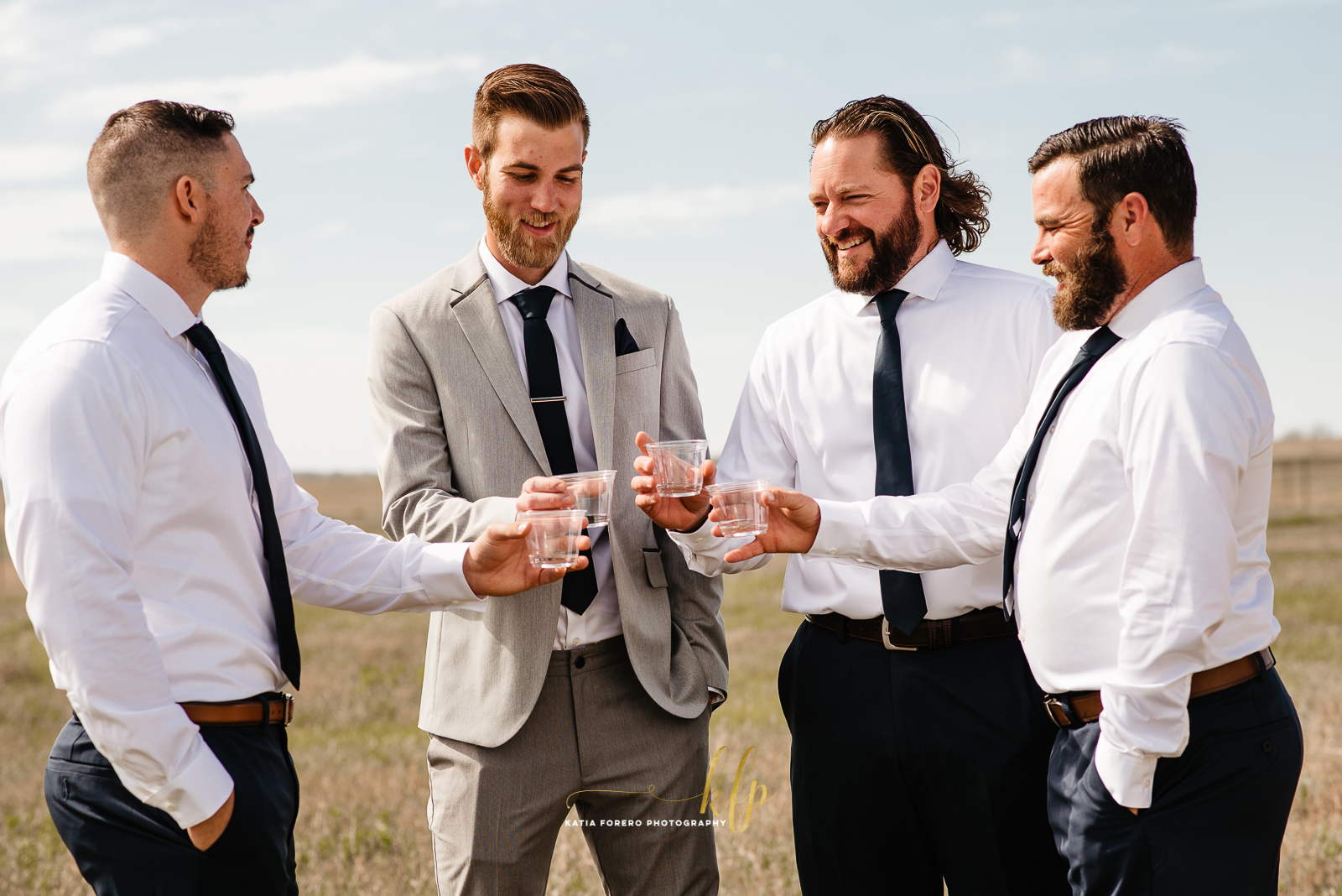 cheers groom and groomsmen
